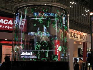 Illustration for article titled Lifefast Transparent 360 Ad Display is LED Craziness in a (Big) Can